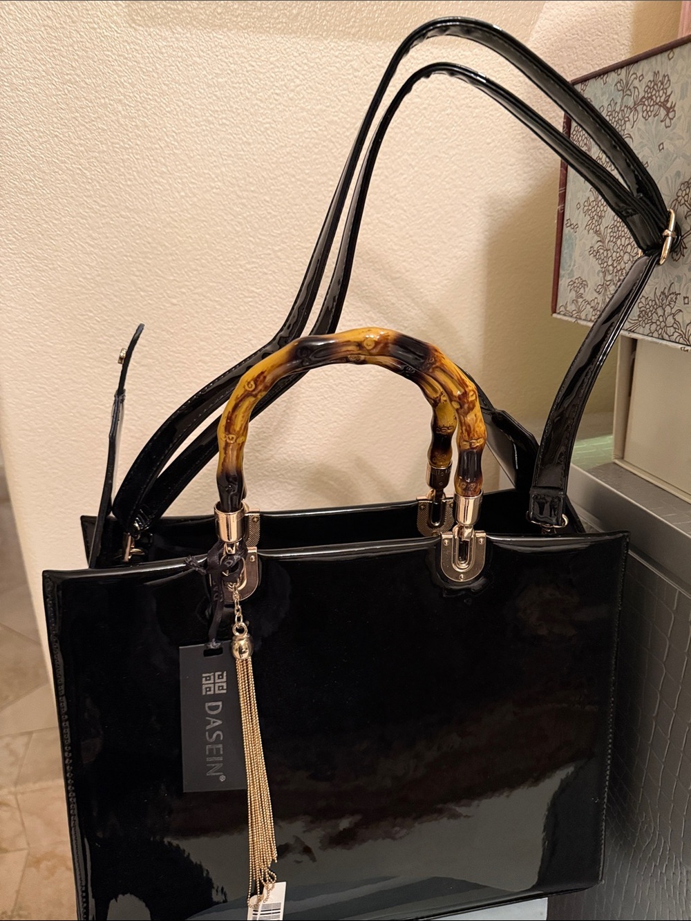 Black Patent leather Tote with Bamboo-Style Handles; 
11 1/2 by 14 1/2 inches